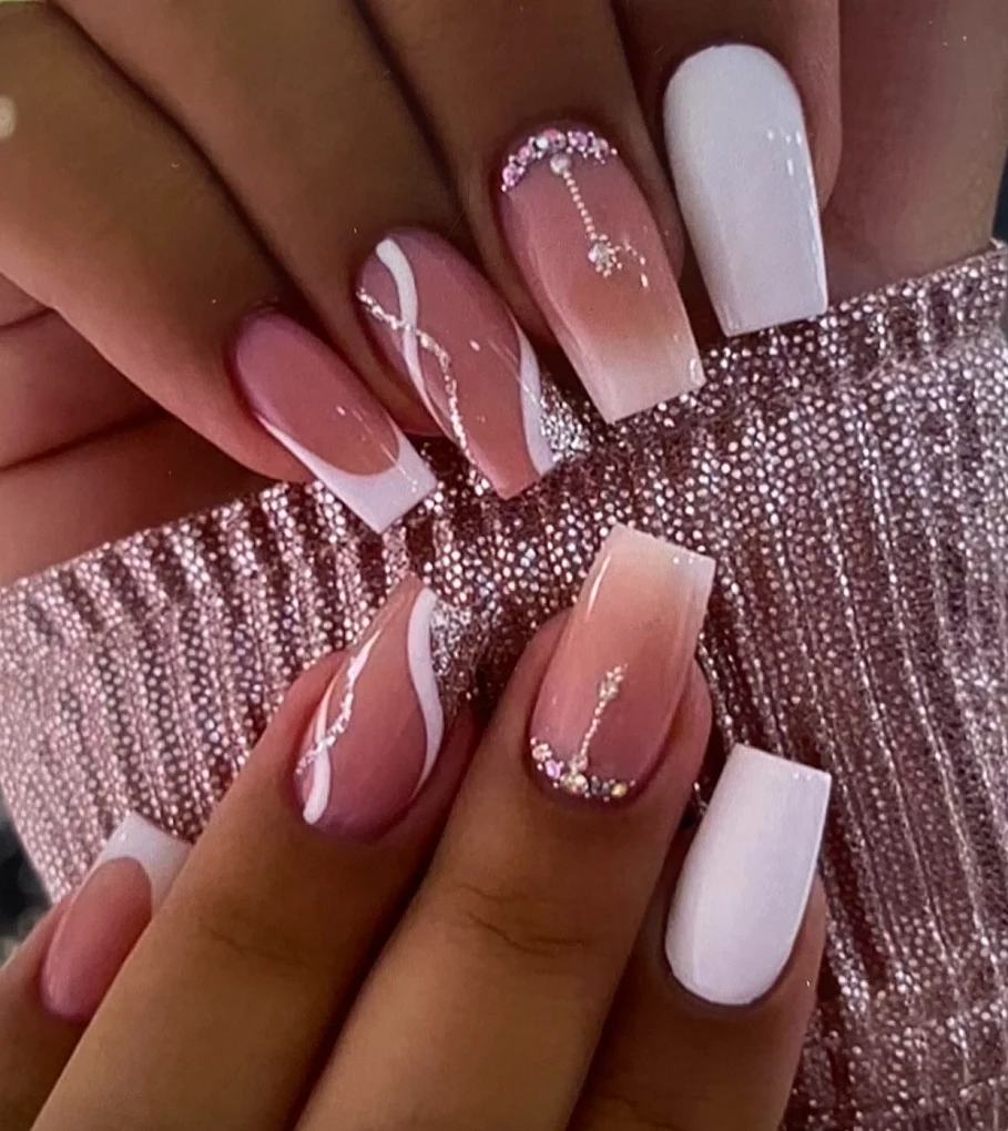Pink ombré French nails with crystal accents